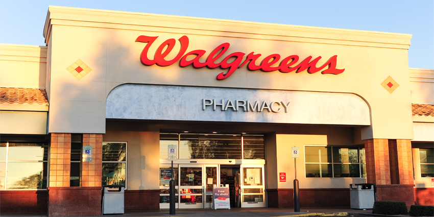 Storefront of a Walgreens Pharmacy building showing brand logo